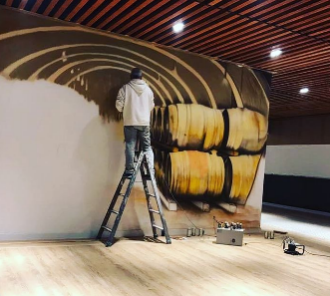 image of a large mural being painted